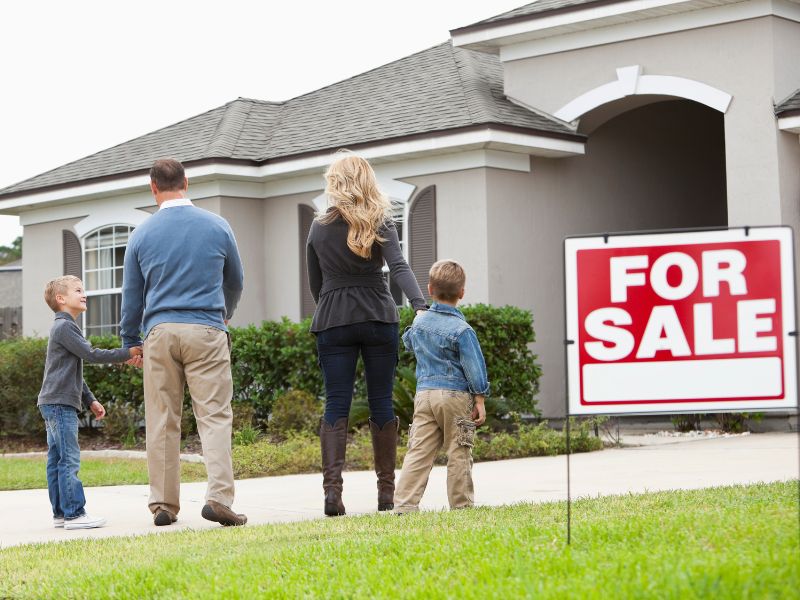 family looking at a house